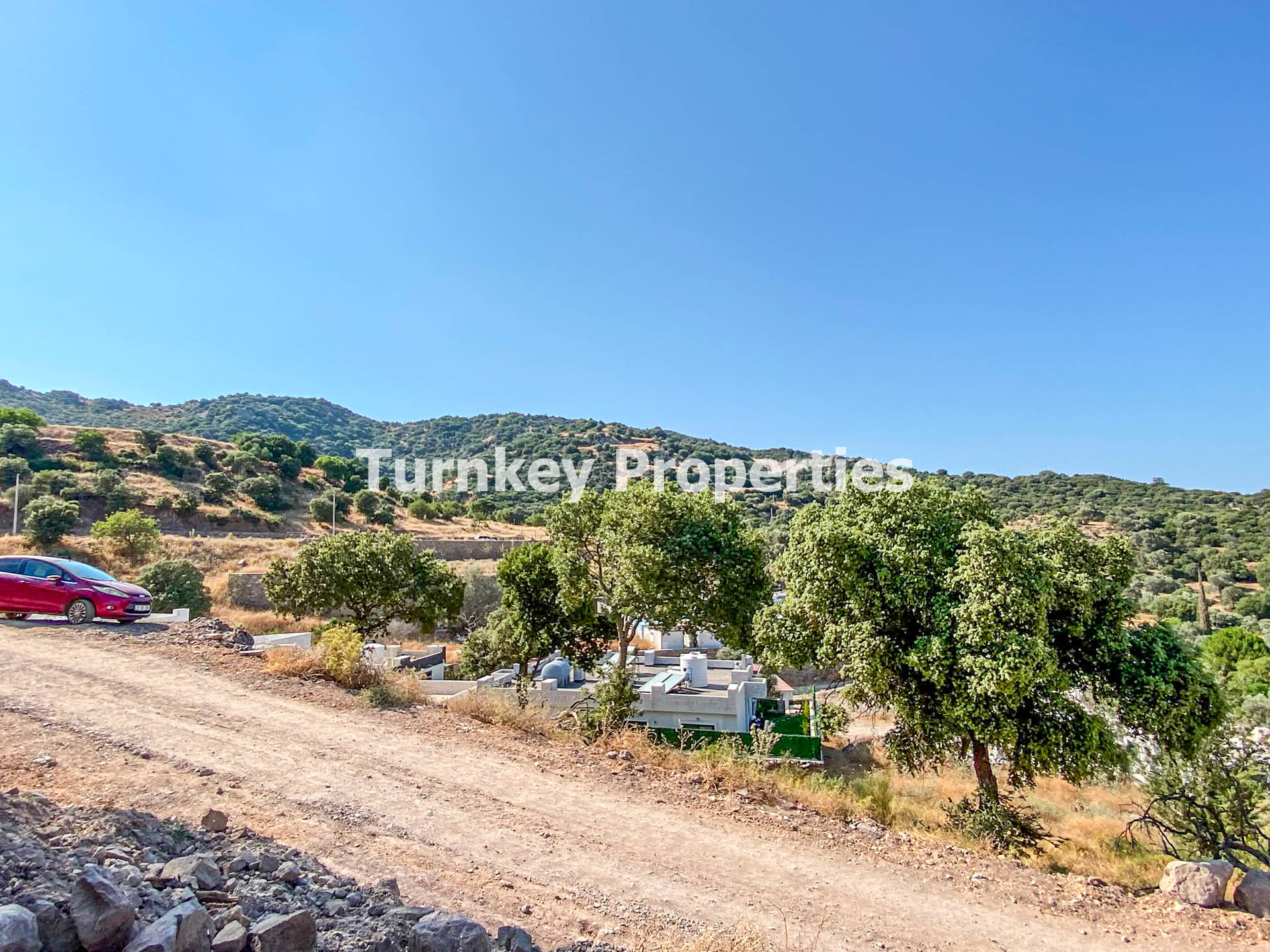 Bodrum Gürece'de Satılık 480 m² Hisseli Zeytinli Tarla Yatırımlık